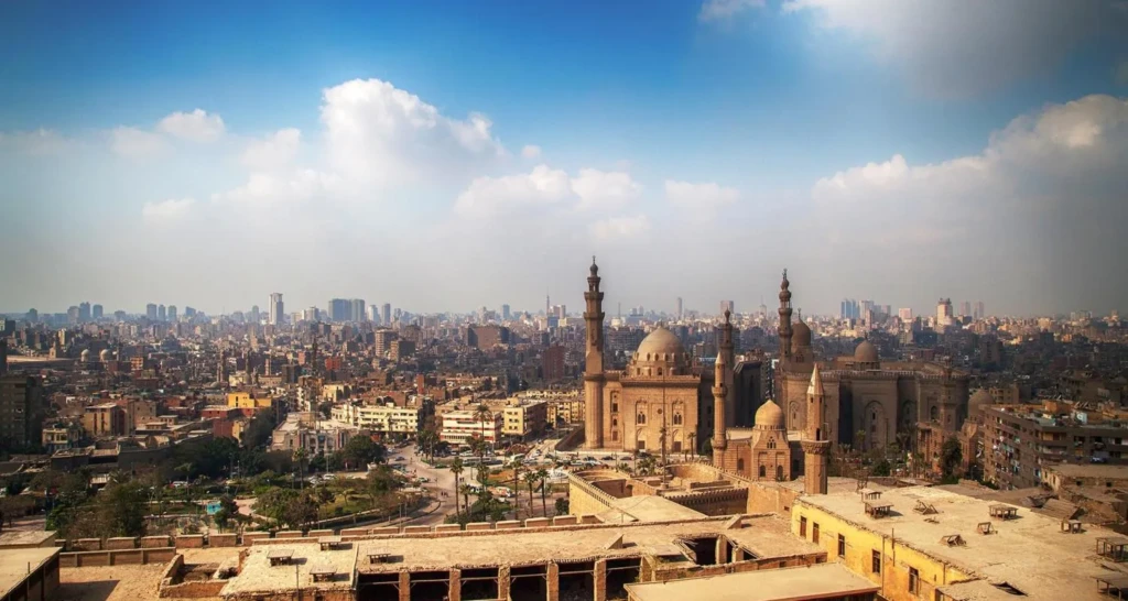 Islamic Cairo skyline with mosques and minarets