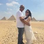 Couple of Delta Tours Egypt guests at the Pyramids of Giza