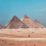 Pyramids of Giza under a clear sky
