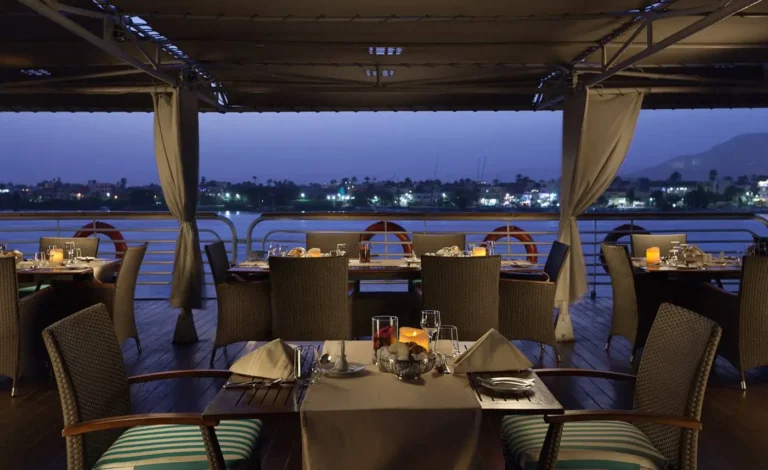 Acamar open-air deck restaurant at night