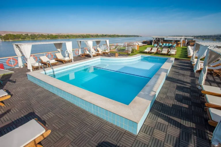 Acamar swimming pool with loungers and white cabanas