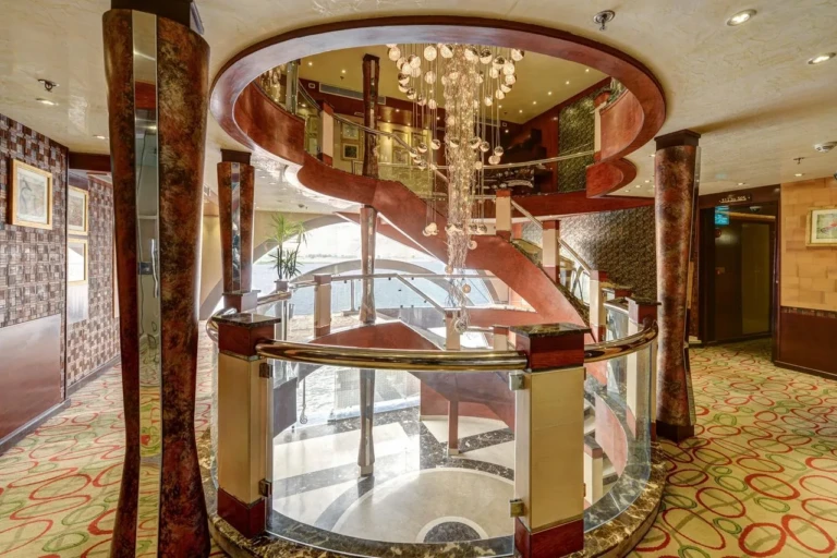 Spiral staircase with chandelier in the Esmeralda atrium