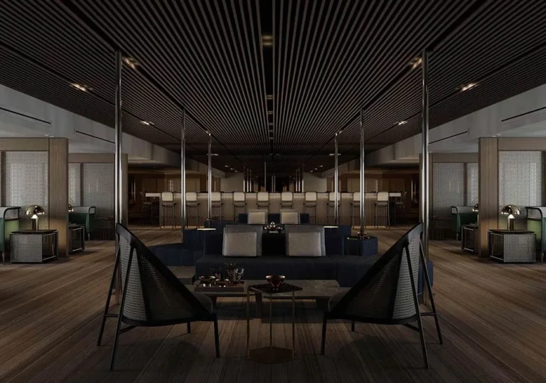 Lounge with slatted ceiling and armchairs on the Historia