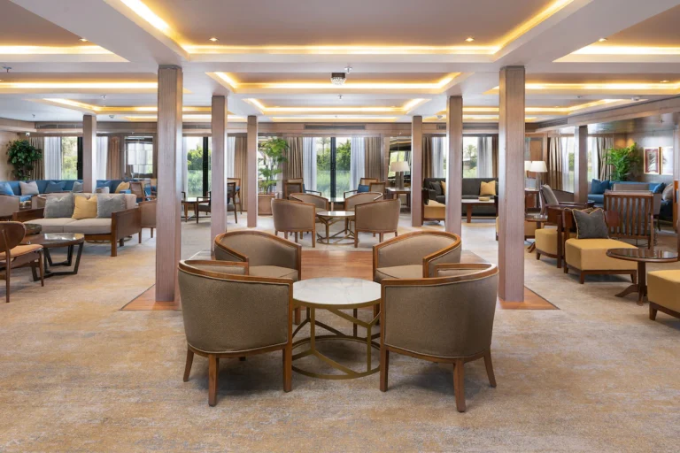 Main lounge with columns and armchair groupings