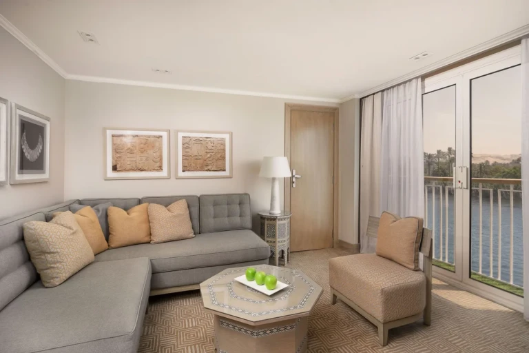 Jaz Viceroy suite living room with corner sofa and balcony door