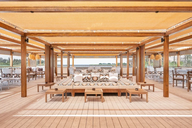 Jaz Viceroy deck pergola with cushioned seating