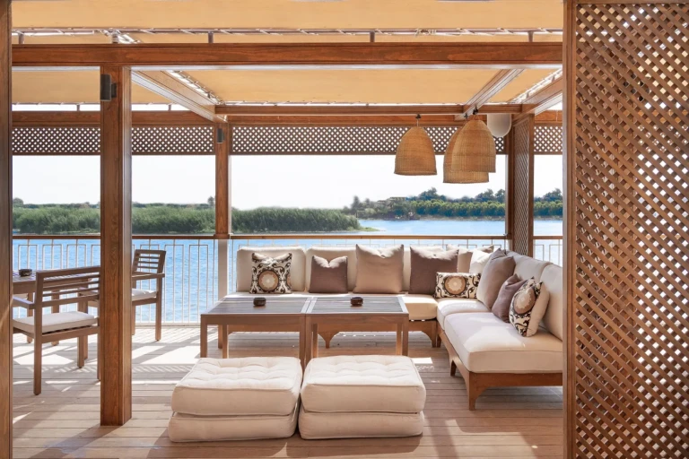 Shaded outdoor lounge with sofas and lanterns on the Jaz Viceroy