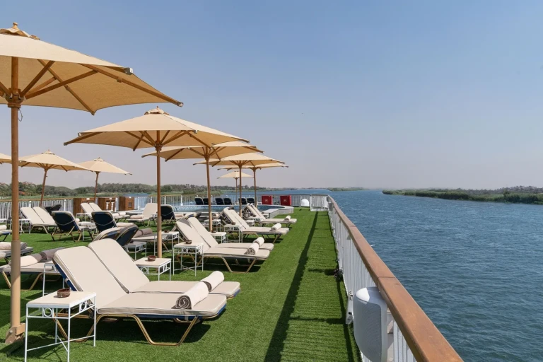 Jaz Viceroy sun deck sunbeds and umbrellas beside the Nile