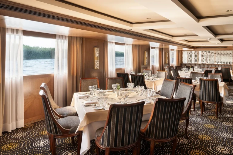 Jaz Viceroy restaurant tables set beside Nile view windows