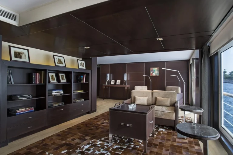 Suite study with bookshelves, sofa and river window on Oberoi Philae
