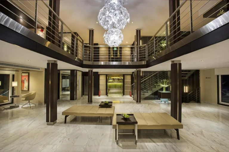 Oberoi Philae atrium with crystal chandelier and upper gallery