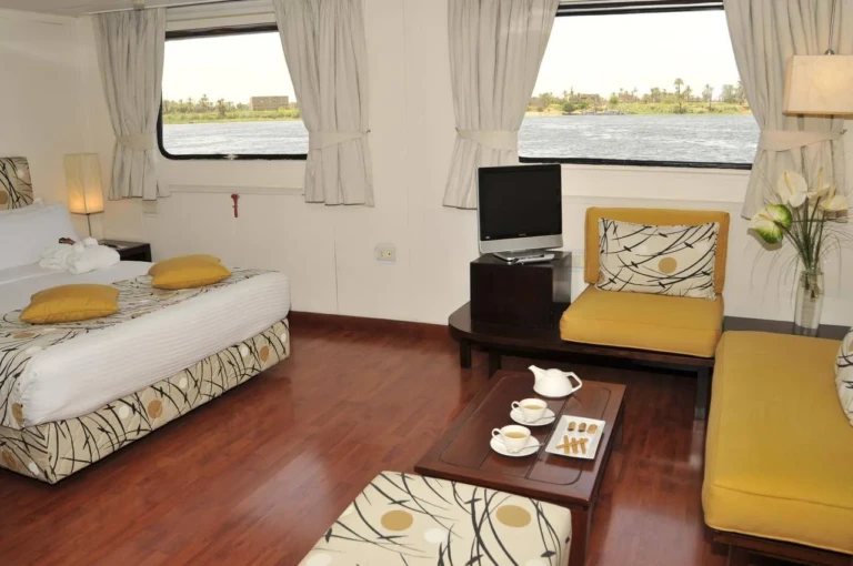 MS Alexander the Great cabin with yellow sofas and Nile windows