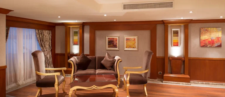 Amwaj Living Stone lounge with sofa and two armchairs