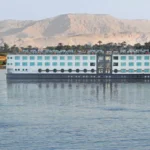 MS Esplanade Nile cruise ship with a felucca nearby