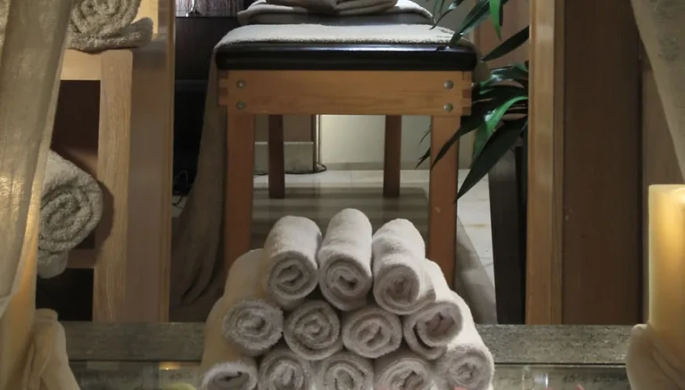 Rolled white towels stacked in the MS Jaz Senator spa