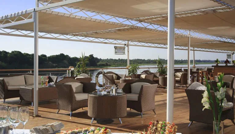 Shaded deck seating with wicker sofas on MS Jaz Senator