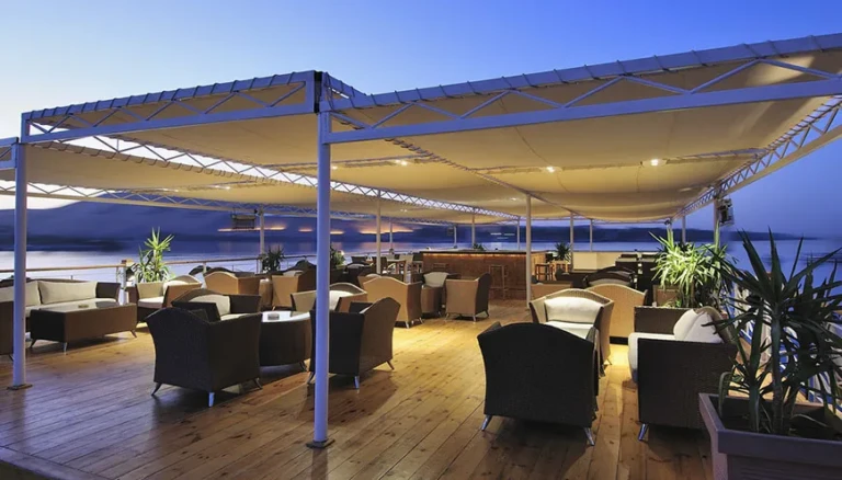 Shaded sun deck lounge at dusk on MS Jaz Senator