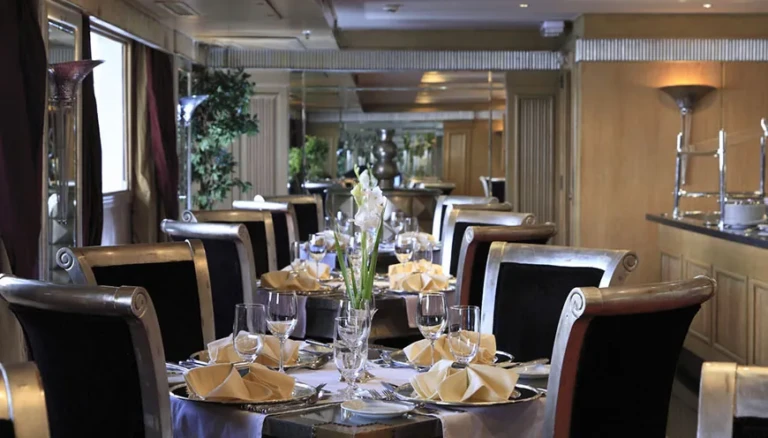MS Jaz Senator restaurant tables set with folded napkins