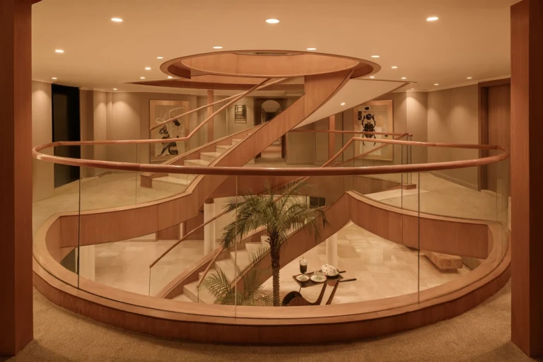 Le Fayan spiral staircase atrium seen from the upper level