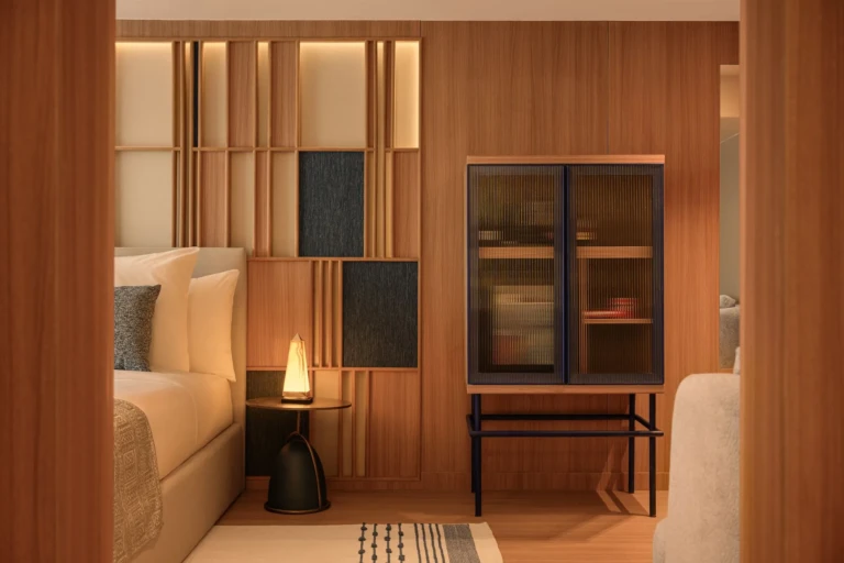 Glass display cabinet and bedside lamp in a Le Fayan cabin