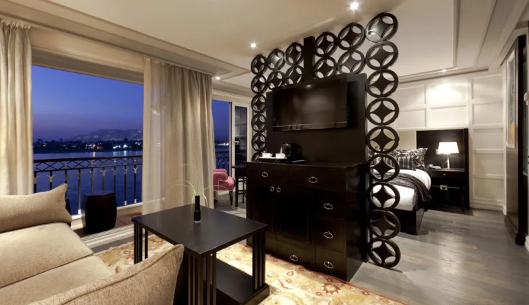 MS Mayfair suite with sitting area, TV cabinet and river balcony