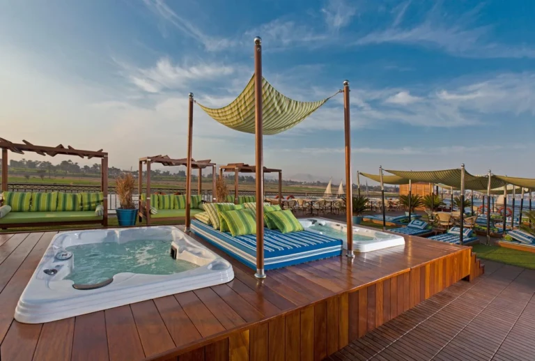 Sun deck jacuzzi and shaded daybeds on the MS Mayfair