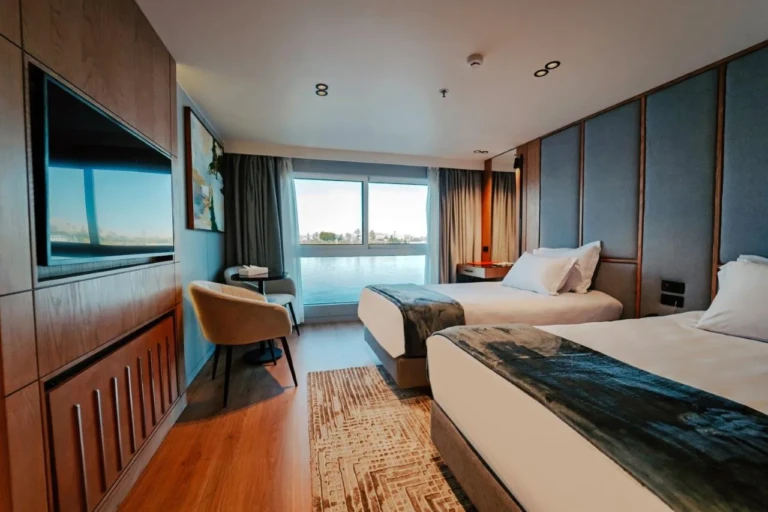 MS Miriam cabin with two single beds and armchair