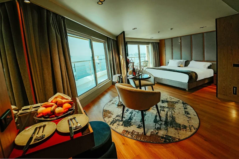 Open-plan MS Miriam suite with sitting area and double bed