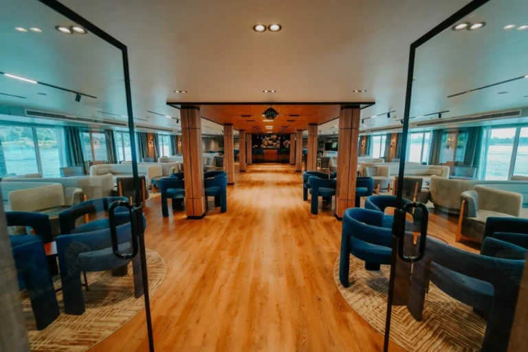 Glass doors opening onto the MS Miriam lounge