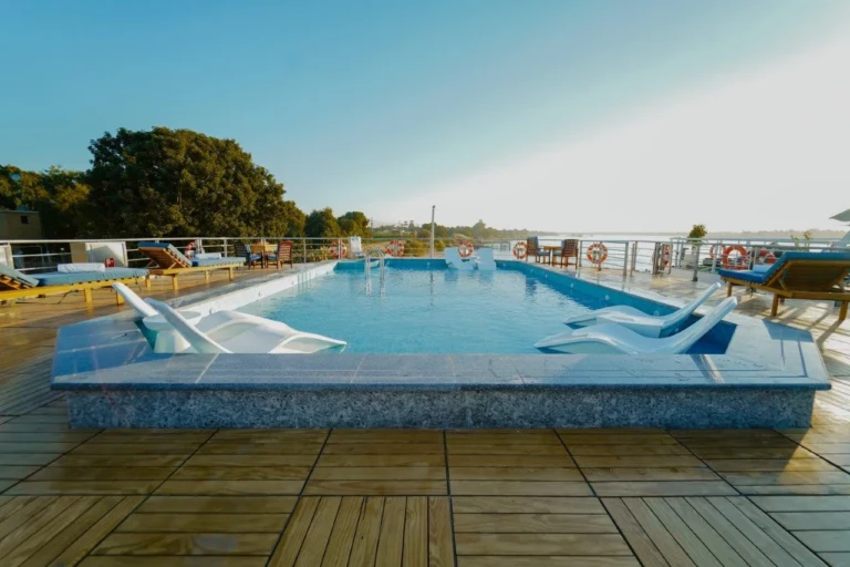 Pool and loungers on the MS Miriam sun deck in daylight