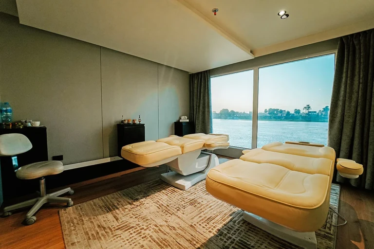 Spa treatment room with massage beds and Nile view on MS Miriam