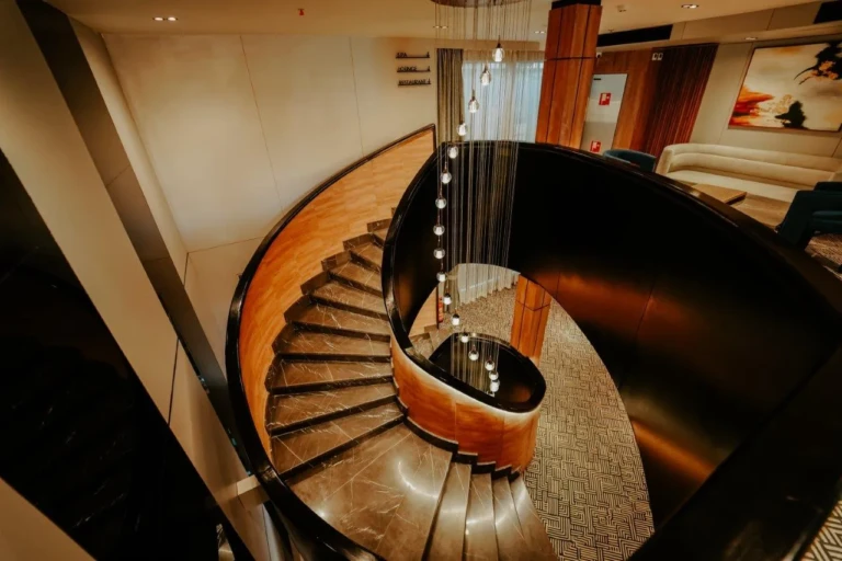 Spiral staircase with hanging lights on MS Miriam