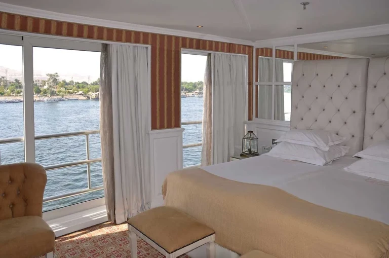 Corner cabin with Nile view French windows and armchair