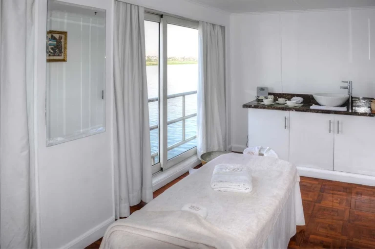 Spa massage bed beside a window with Nile view