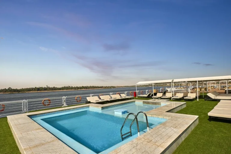 Sun Ray sun deck pool with loungers and shaded seating