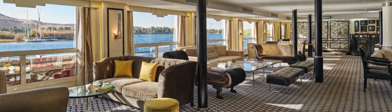 Movenpick MS Hamees lounge with sofas and Nile view windows