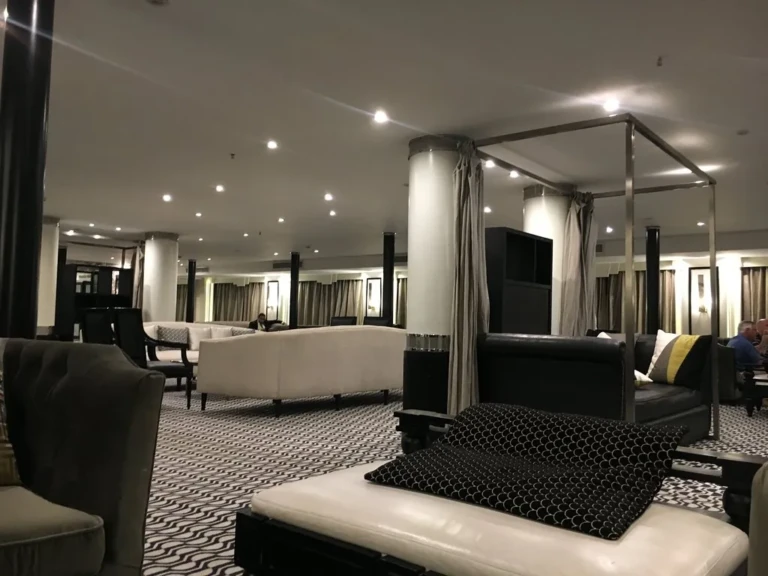 Lounge with canopy daybed and white sofas on the Movenpick MS Hamees