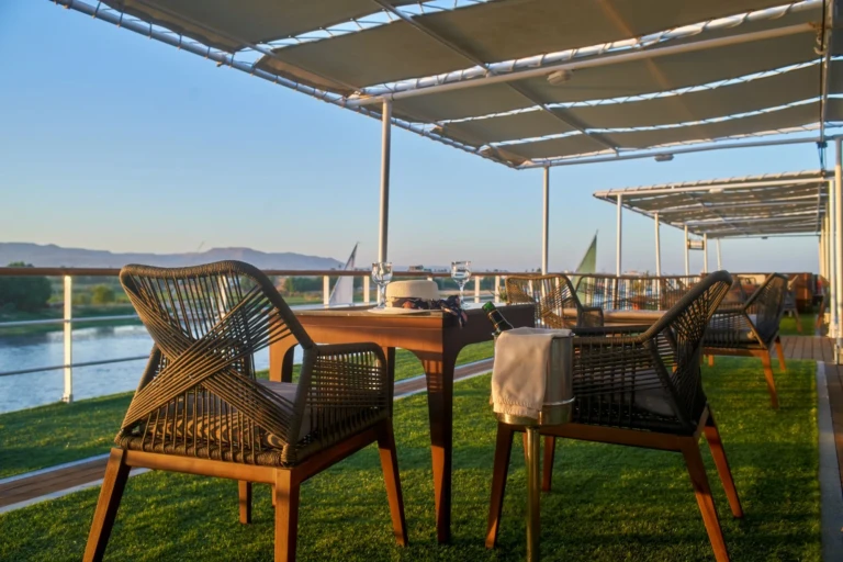 Shaded deck seating with wicker chairs on the Royal Lily