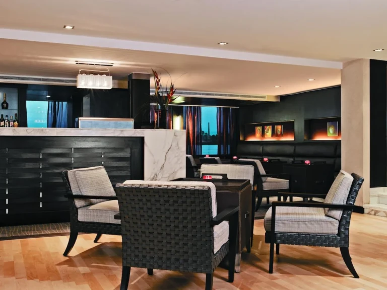 Bar with wicker armchairs on the Oberoi Zahra