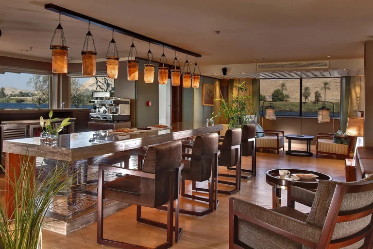 Bar with pendant lanterns, stools and lounge seating