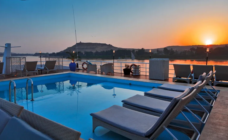 Sun Boat IV pool and sunbeds at sunset over the Nile