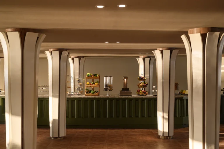 Soleil buffet counter framed by white columns