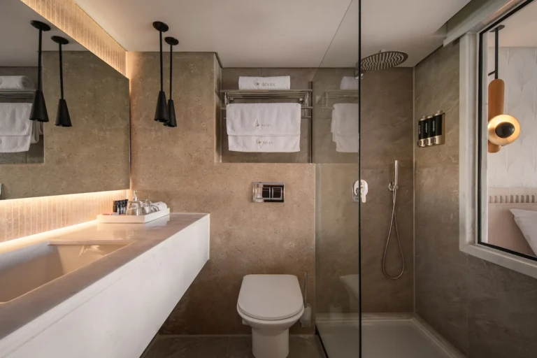 Soleil cabin bathroom with walk-in shower and long vanity