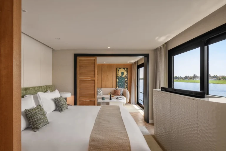 Soleil suite double bed facing a Nile view window