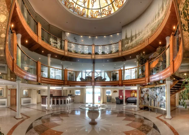Lobby with circular balconies and marble floor on the Sonesta Moon Goddess