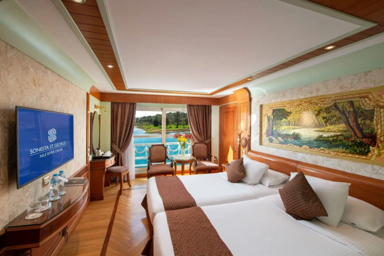 Twin bed cabin with TV, wall painting and balcony door