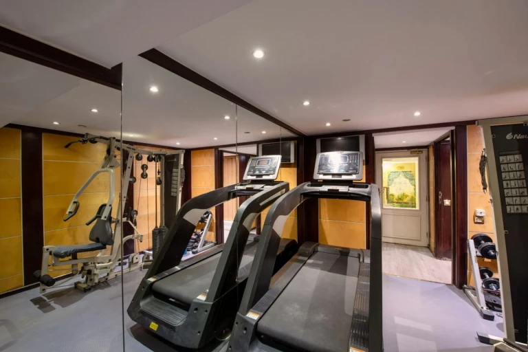 Gym with treadmills and a weight machine