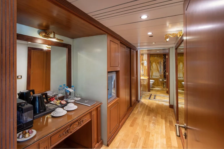 Suite hallway with coffee station, minibar and wooden floor