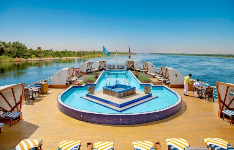 Sun deck plunge pool surrounded by loungers on a sunny day