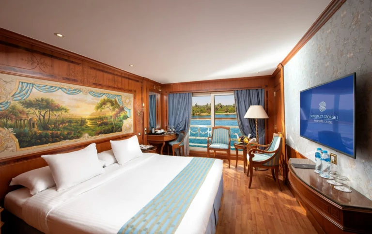 Double bed cabin with TV, desk and balcony window